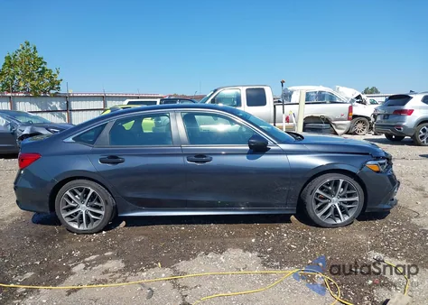 2023 Honda Civic Touring z USA, uszkodzony, nr VIN 2HGFE1F94PH321019